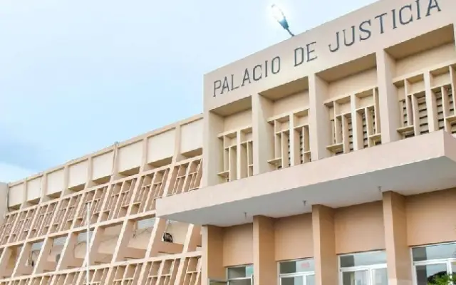 Encarcelan 2 empleados DGM acusados de traficar haitianos