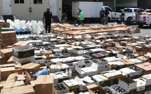 Desmantelan una de mayores fábricas de alcohol adulterado