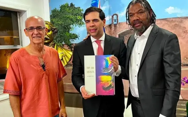 EU: Artista Van Robert entrega libro a ministro Cultura de RD